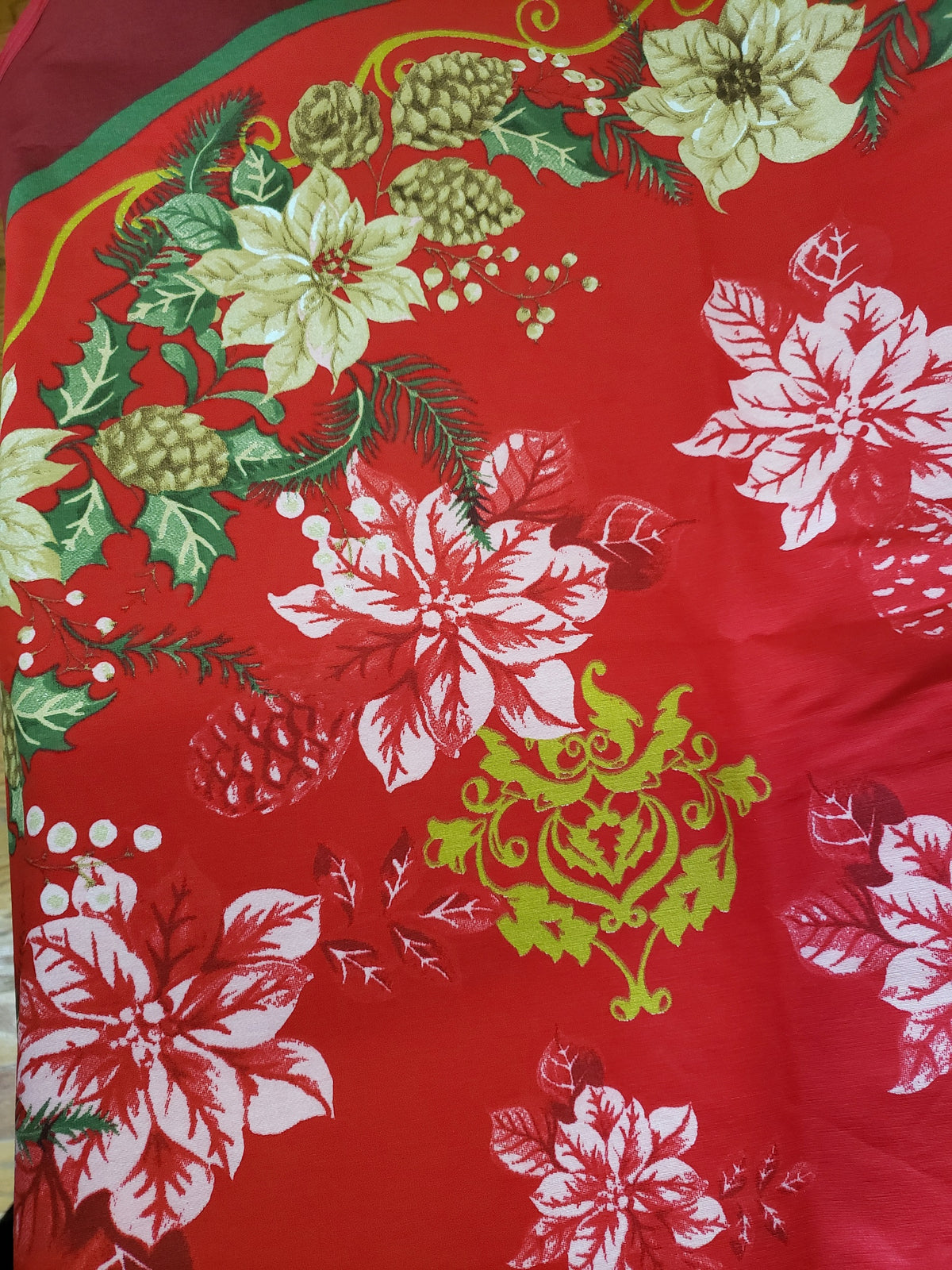 Christmas Holiday Printed tablecloth with pink poinsettias, pine cones and gold details