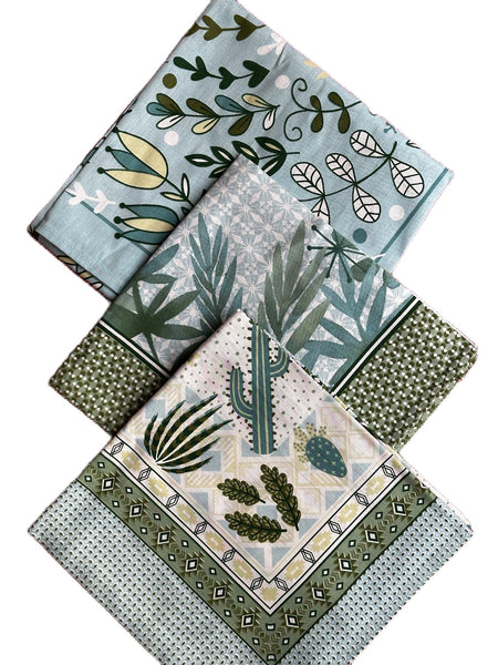 Table topper with tropical print in shades of green color. Size 40 inch Square