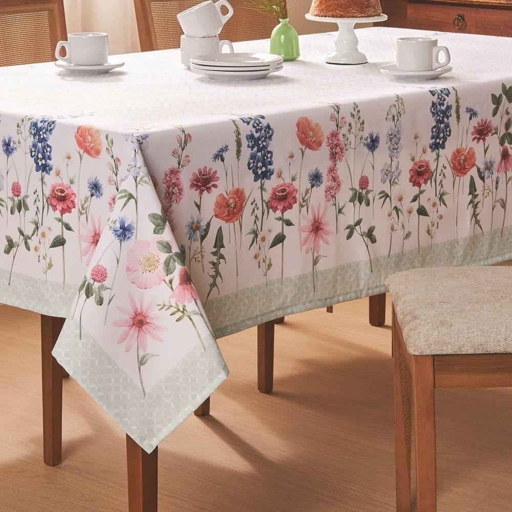 Seja-como-Flor White Printed tablecloth with wildflowers in shades of pink and blue with a patterned light green border